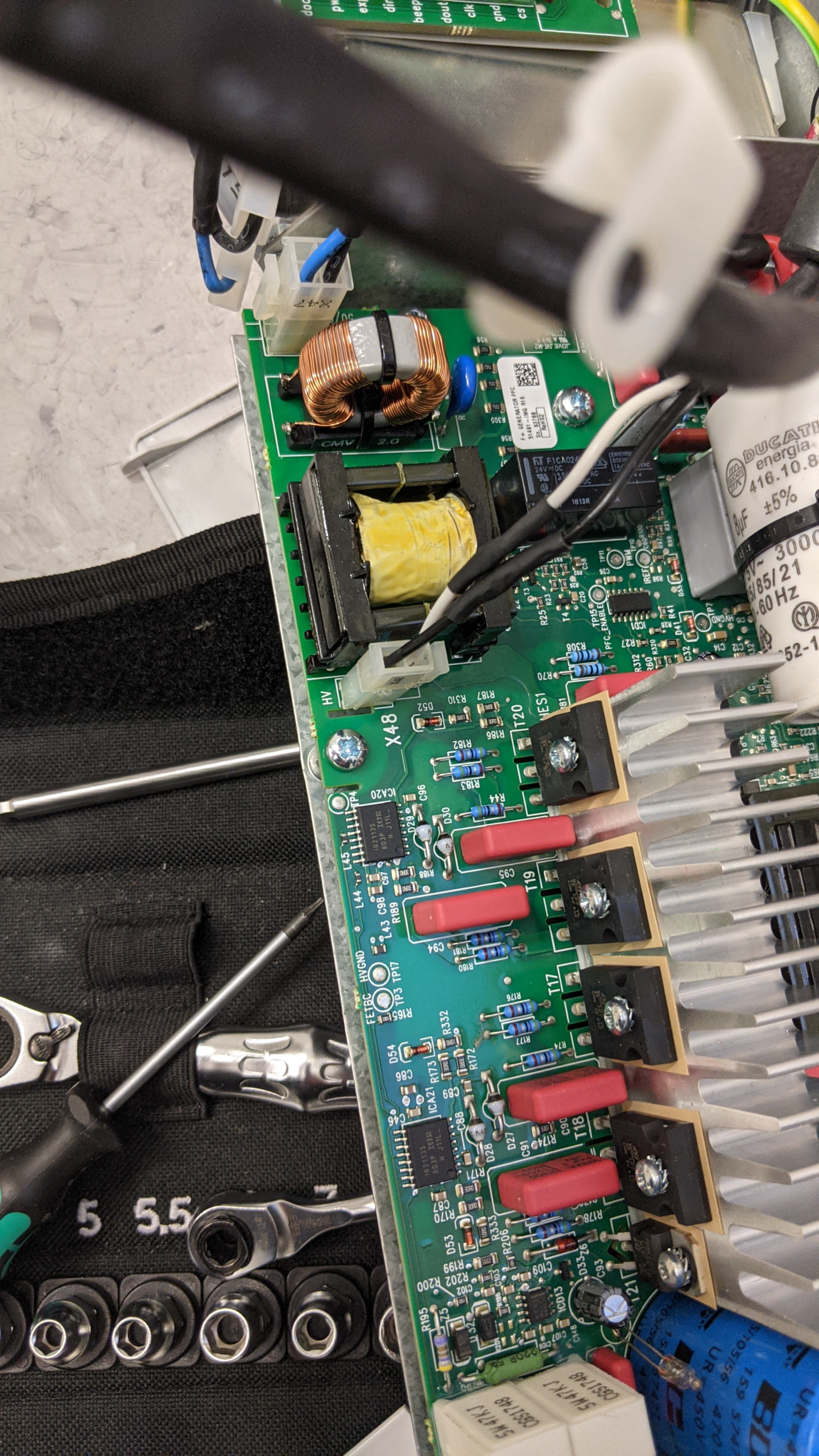 Technician troubleshooting dental chair limit switch and position sensor issues causing the chair not to rise